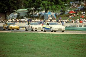Rick Moskalik's Porsche 944 Turbo, Leigh Miller's Porsche 944 S2 and Harry Hatch's Porsche 968