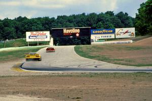 Scott Sharp's Chevy Camaro chases Jeff Purner's Chevy Camaro