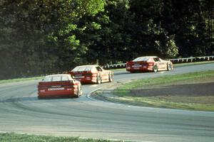 Tommy Archer leads Bobby Archer and Mitch Wright, all in Dodge Daytonas.