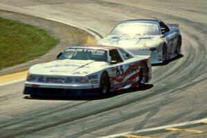 Jim Stevens' Ford Mustang and Irv Hoerr's Chevy Camaro