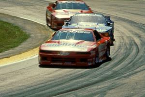 Tommy Archer's Dodge Daytona, Ron Fellows' Ford Mustang and Bobby Archer's Dodge Daytona