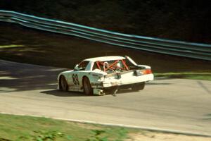 Bill Gray's Chevy Camaro has lost even more bodywork at the end of the race.