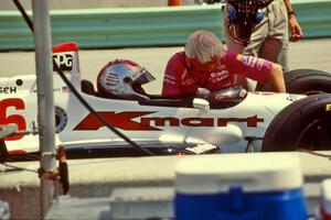 Mario Andretti's Lola T-93/06/Ford Cosworth XB on pit lane.