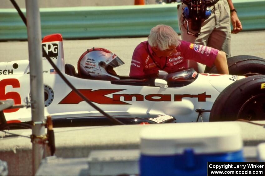 Mario Andretti's Lola T-93/06/Ford Cosworth XB on pit lane.