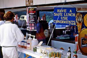 Sign hanging from the Elkhart Lake Lions concession stand.