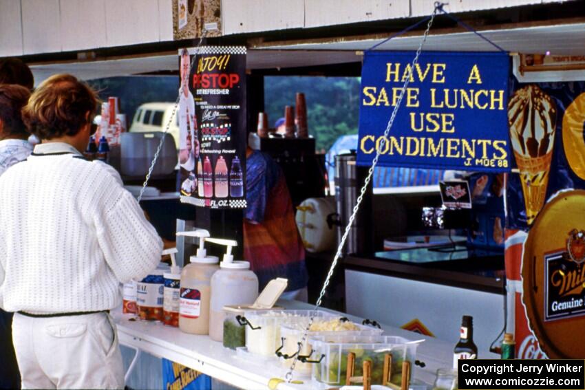 Sign hanging from the Elkhart Lake Lions concession stand.