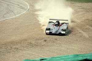 The Shelby Can-Am car of ??? slides off into the barrier at Canada Corner during qualifying.