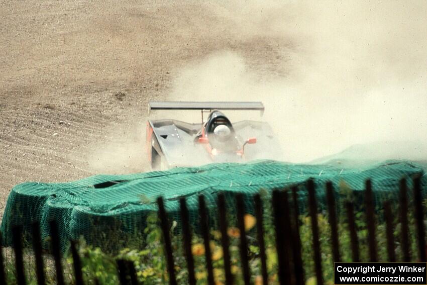 The Shelby Can-Am car of ??? slides off into the barrier at Canada Corner during qualifying.
