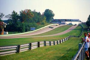 The Shelby Can-Am cars of Robert Urich and Bob Gardner head into the pits after completing just eight laps.