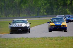 Tom Fuehrer's ITE-1 Ford Mustang and Scott Sinnott's ITR BMW 325i