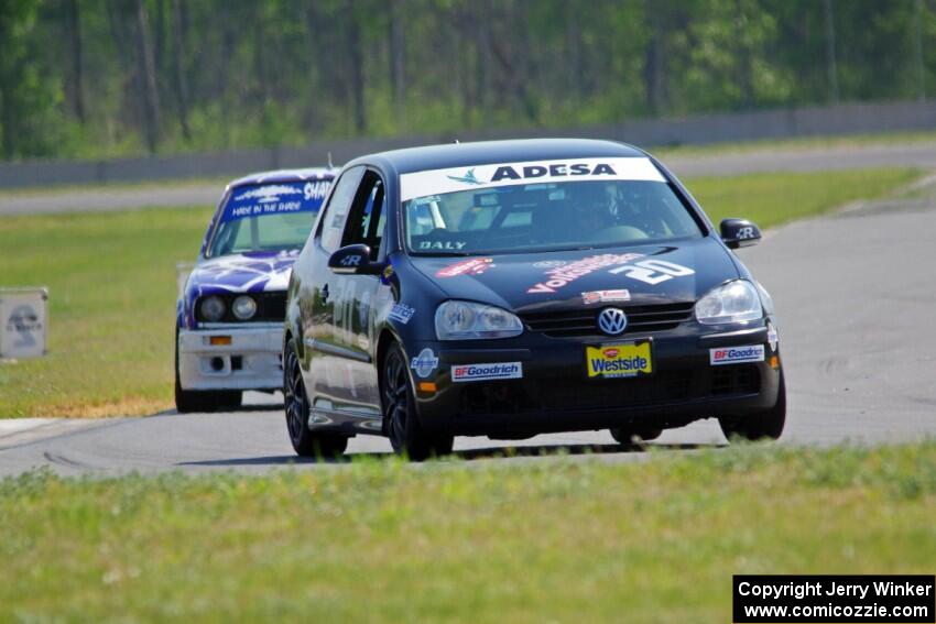 Tom Daly's STU VW Rabbit and Mike Campbell's ITA BMW 325is