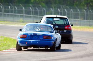 Tom Daly's STU VW Rabbit and Paul Pridday's Spec Miata Mazda Miata