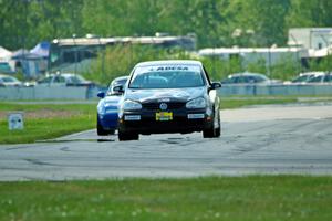 Tom Daly's STU VW Rabbit and Paul Pridday's Spec Miata Mazda Miata