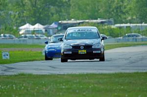 Tom Daly's STU VW Rabbit and Paul Pridday's Spec Miata Mazda Miata