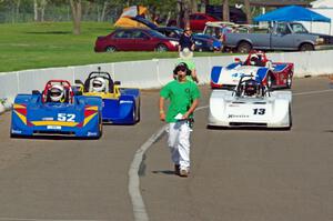 Four Spec Racer Fords line up on the false grid for the final race of the day.