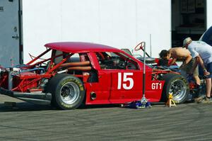 Ed Dulski's GT-1 Olds Cutlass Supreme in the paddock.