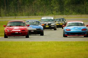 Rick Buan's, Andrew Jenkins' and Gordon Kuhnley's Spec Miata Mazda Miatas