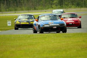 Gordon Kuhnley's, Andrew Jenkins' and Greg Youngdahl's Spec Miata Mazda Miatas