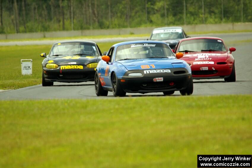 Gordon Kuhnley's, Andrew Jenkins' and Greg Youngdahl's Spec Miata Mazda Miatas