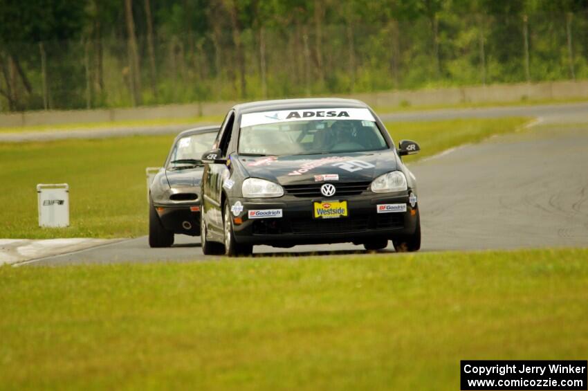 Tom Daly's T4 VW Rabbit and Cody Lindman's STL Mazda Miata