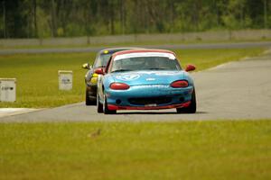 Rick Buan's and Greg Youngdahl's Spec Miata Mazda Miatas