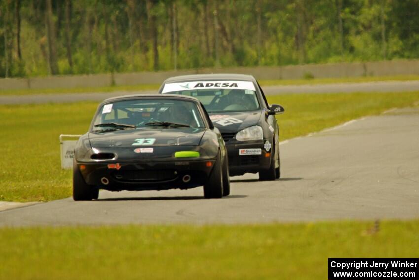 Cody Lindman's STL Mazda Miata and Tom Daly's T4 VW Rabbit