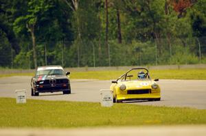 Brooke Fairbanks' H Production Triumph Spitfire and Jessica Johnk's ITJ BMW 325i