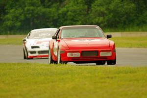 Matt Lawson's ITE-2 Porsche 944 and Jim Hall's ITE-1 Chevy Camaro