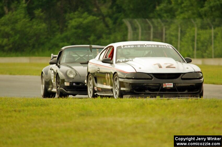 Tom Fuehrer's ITE-1 Ford Mustang and Phil Magney's ITE-1 Porsche 993
