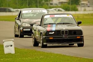 Jessica Johnk's ITJ BMW 325i and Tom Daly's T4 VW Rabbit