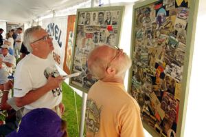 Bill Peters and ??? look at old track memorabilia.