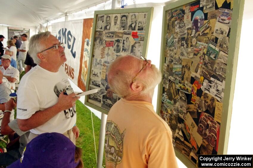 Bill Peters and ??? look at old track memorabilia.