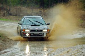 Jordan Locher / Tom Addison Subaru Impreza 2.5RS on SS1, J5 North I.