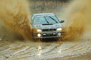 Jordan Locher / Tom Addison Subaru Impreza 2.5RS on SS1, J5 North I.