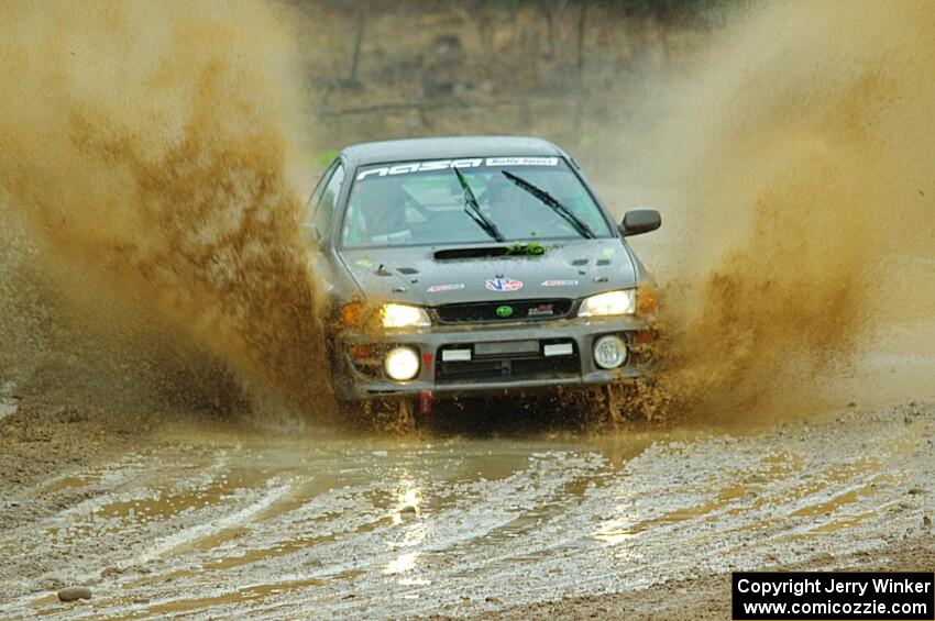 Jordan Locher / Tom Addison Subaru Impreza 2.5RS on SS1, J5 North I.