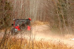 A Jeep Wrangler sweeps SS1.