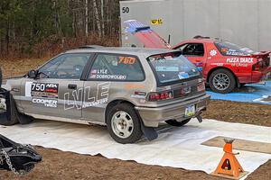 Nick Lyle / Kevin Dobrowolski Honda Civic Si and Al Dantes, Jr. / Marty Passuello Mazda RX-7 LS before the start of the event.