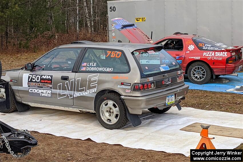 Nick Lyle / Kevin Dobrowolski Honda Civic Si and Al Dantes, Jr. / Marty Passuello Mazda RX-7 LS before the start of the event.