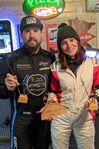 Kyle Tilley and Sarah Freeze pose with their trophies for winning the event.