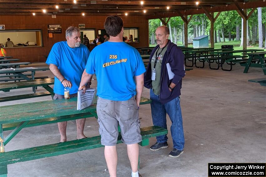 Mark Rokus, Mike Van Alphen and Mark Lietha chat prior to the start of the rally.