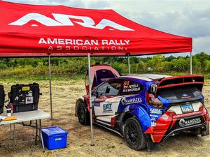 Piotr Fetela / Aris Mantopoulos Ford Fiesta Proto heads through tech before the start.