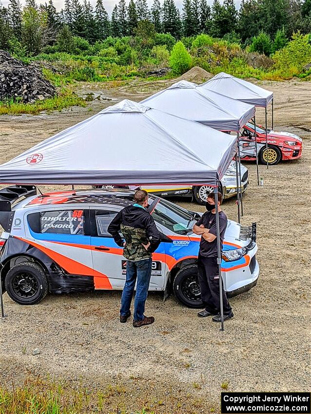 Pat Moro / Ole Holter Chevy Sonic LS heads through tech before the start of the event.