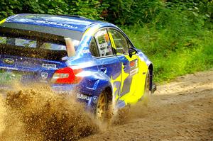 Travis Pastrana / Rhianon Gelsomino Subaru WRX STi on SS4, Steamboat II.