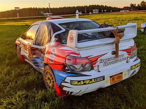 Dan Colburn / Cameron Case Subaru Impreza showing battle scars from the event after the rally.