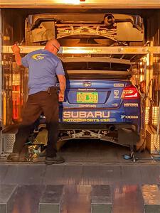 The Subaru WRX STis of Travis Pastrana / Rhianon Gelsomino and Brandon Semenuk / Johm Hall are loaded into the trailer.