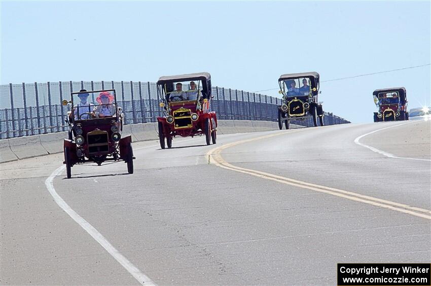 Roger Garnett's 1908 Maxwell, Jeff Schreiner's 1908 Maxwell, Ken Ganz's 1909 Buick and Wes Ranard's 1909 Mason