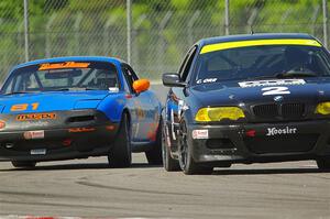 Chris Orr's T3 BMW 330Ci and Gordon Kuhnley's Spec Miata Mazda Miata