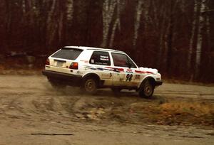 Bob Nielsen / Al Kintigh come past at speed at the crossroads spectator location in their VW GTI.