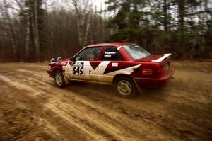 Eric Seppanen / Jake Himes at speed through a fast sweeper on East Steamboat Rd. in their Nissan Sentra SE-R.