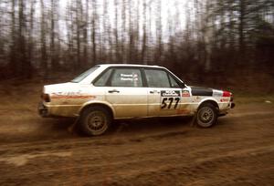 Ken Hawley / Kathy Freund slide through the mud on East Steamboat Rd. in their Audi 4000 Quattro.